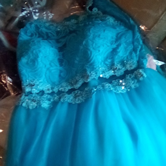 A blue dancing queen dancing  has one small spot on it shown in picture - Picture 2 of 3